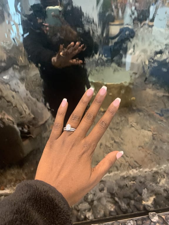 Oval diamond ring on hand