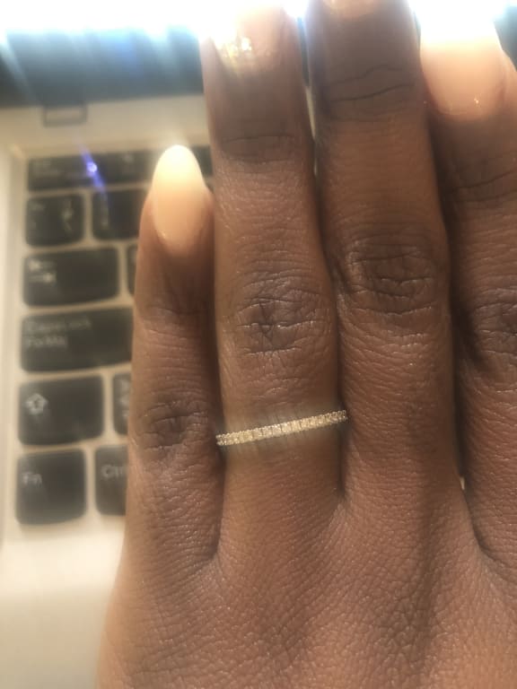 Oval diamond ring on hand
