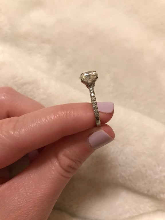 Oval diamond ring on hand