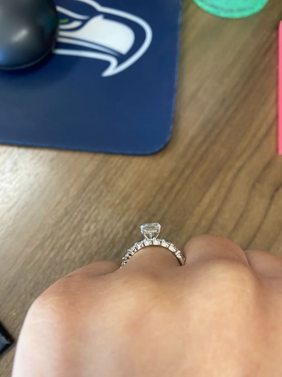 Oval diamond ring on hand