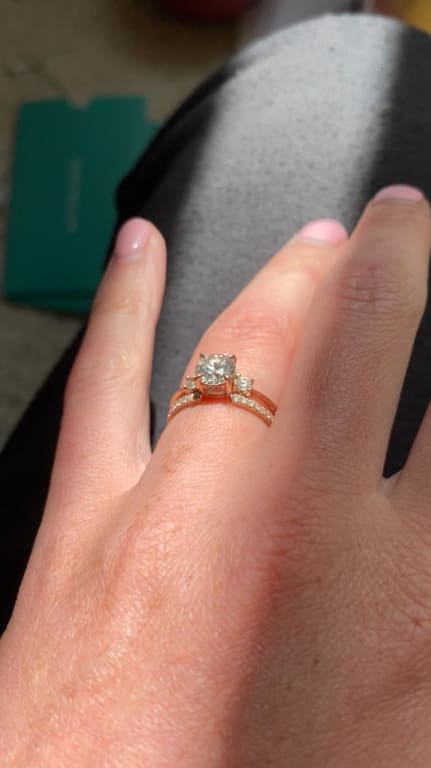 Oval diamond ring on hand