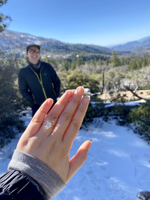 Oval diamond ring on hand