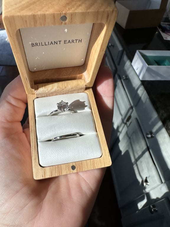 Oval diamond ring on hand