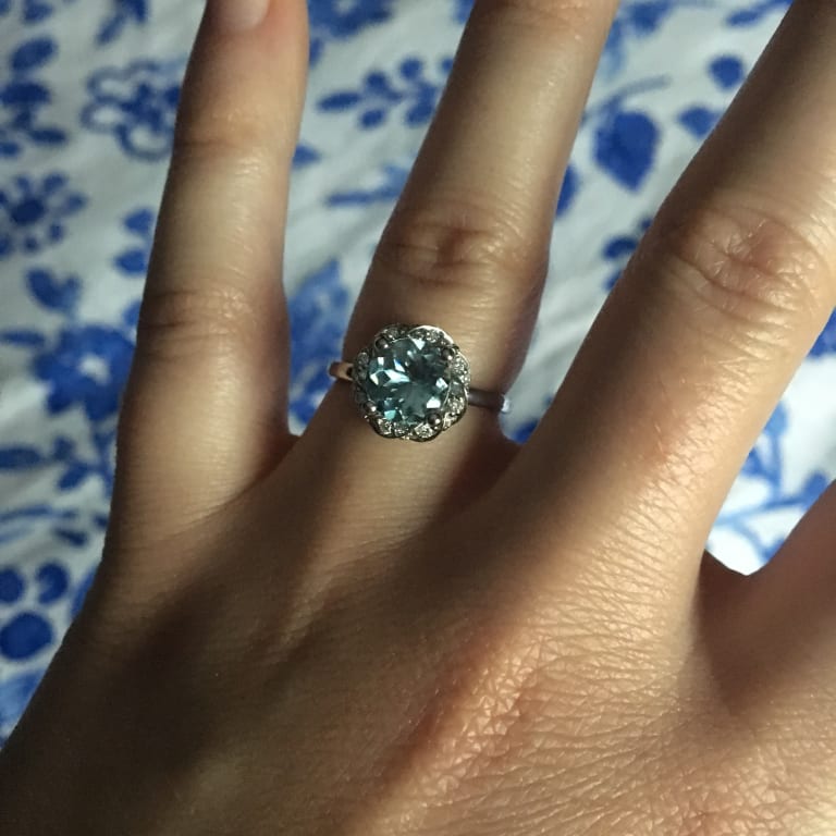 Oval diamond ring on hand