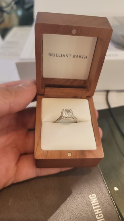 Oval diamond ring on hand