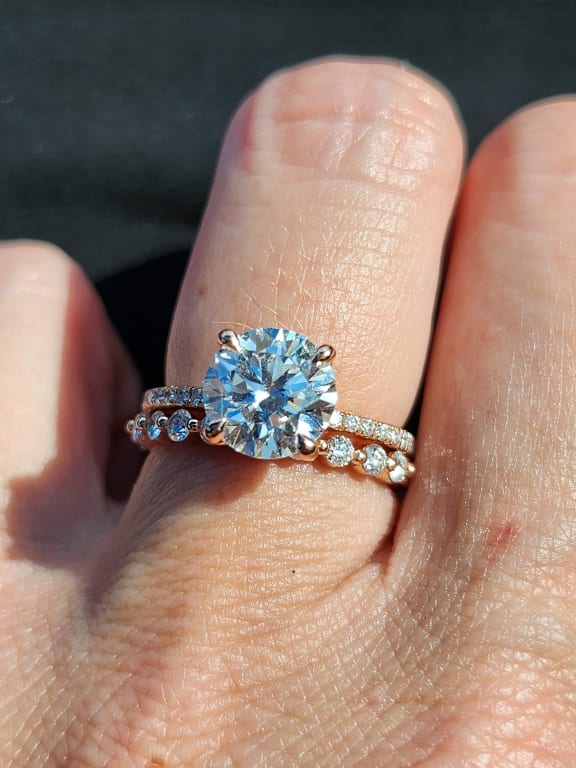 Oval diamond ring on hand
