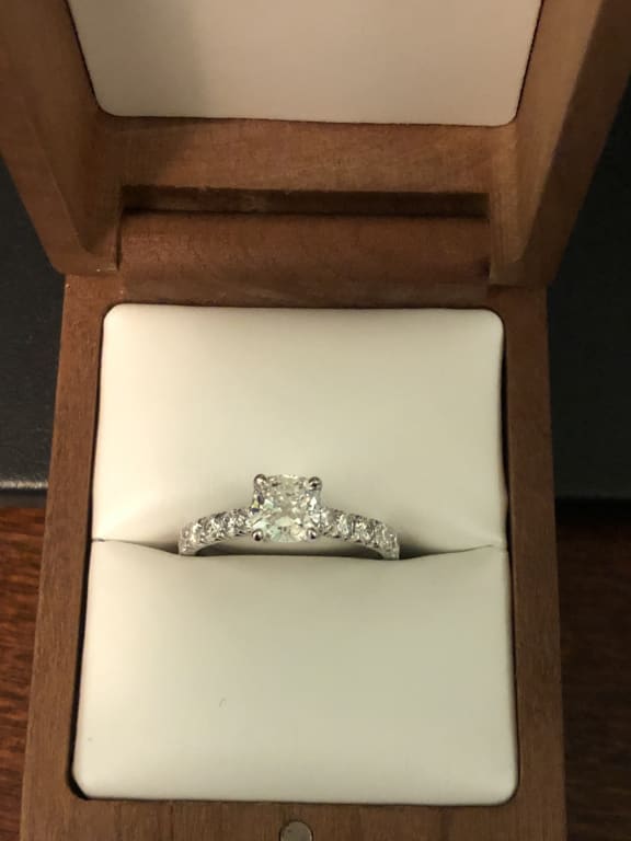 Oval diamond ring on hand