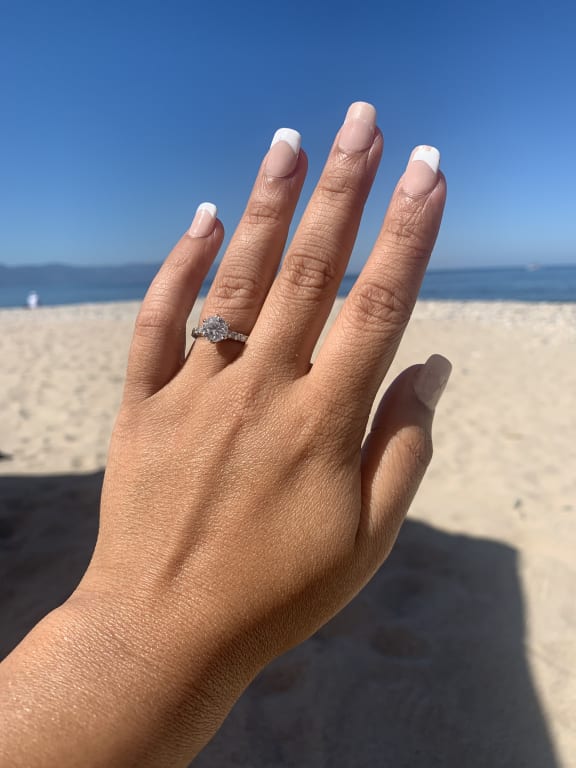 Oval diamond ring on hand