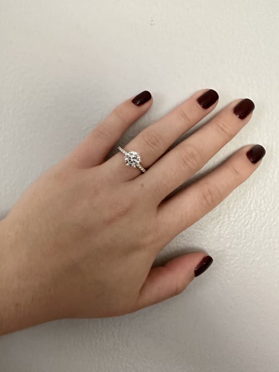 Oval diamond ring on hand