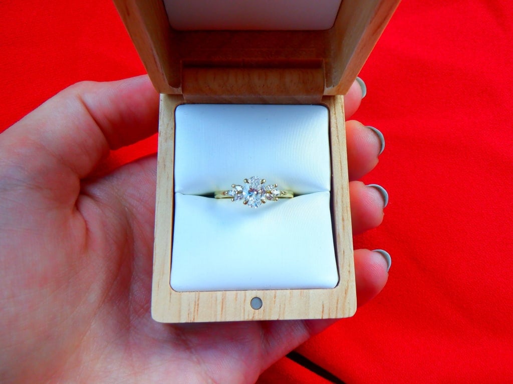 Oval diamond ring on hand