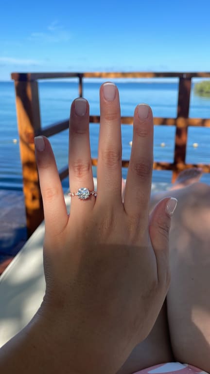 Oval diamond ring on hand