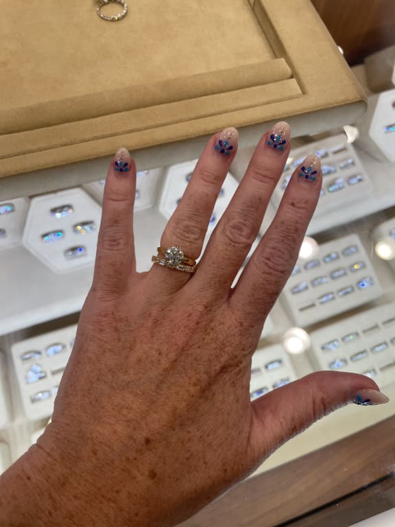 Oval diamond ring on hand