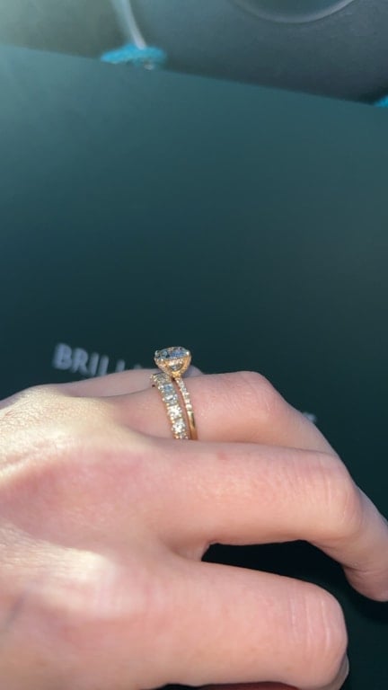 Oval diamond ring on hand