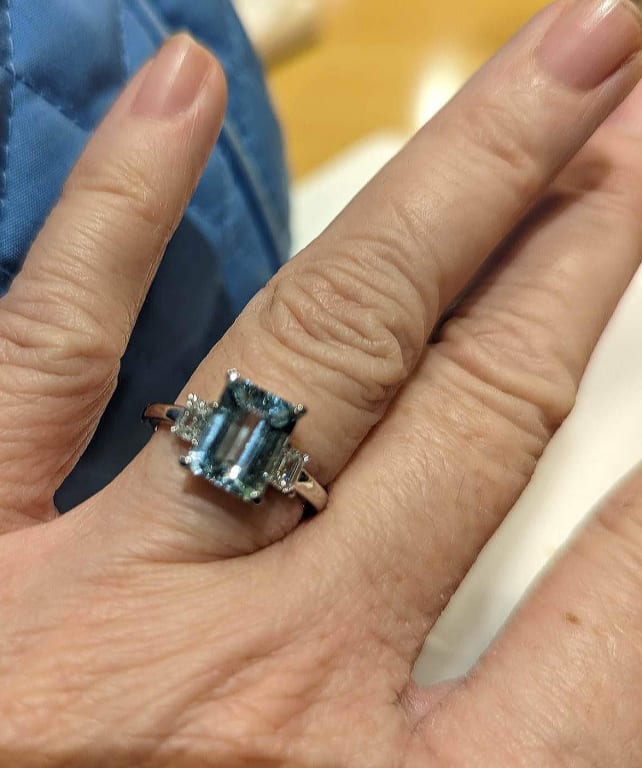 Oval diamond ring on hand