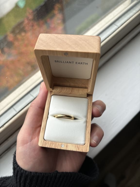 Oval diamond ring on hand