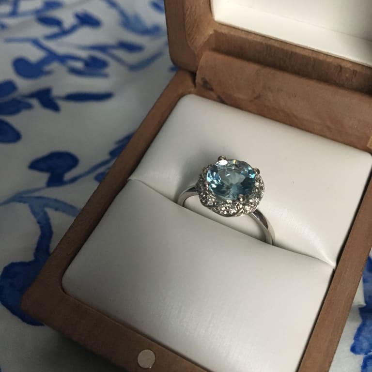 Oval diamond ring on hand