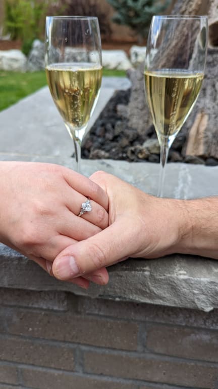 Oval diamond ring on hand