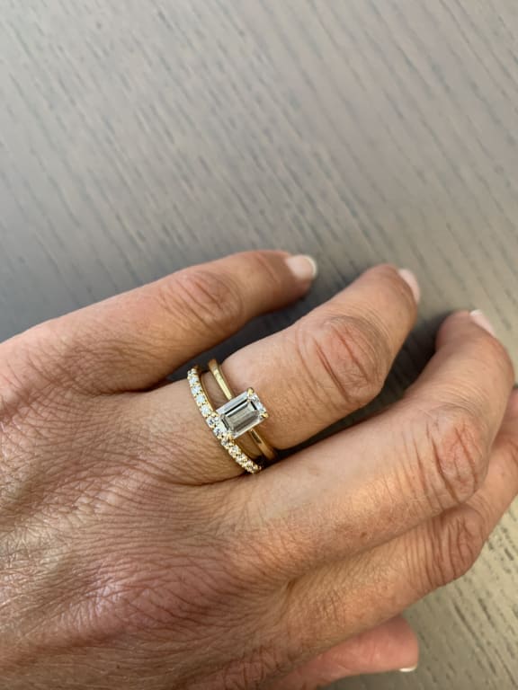 Oval diamond ring on hand