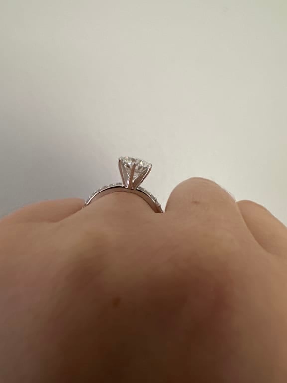 Oval diamond ring on hand