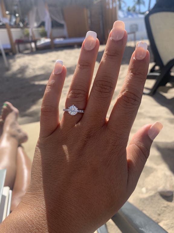 Oval diamond ring on hand