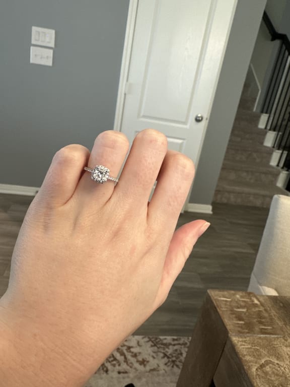 Oval diamond ring on hand