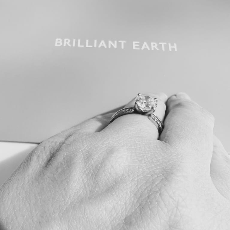 Oval diamond ring on hand