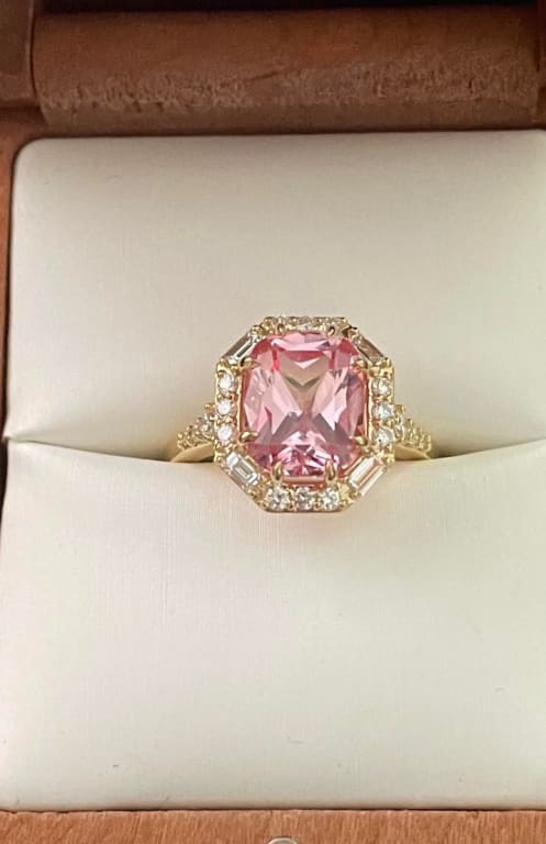 Oval diamond ring on hand