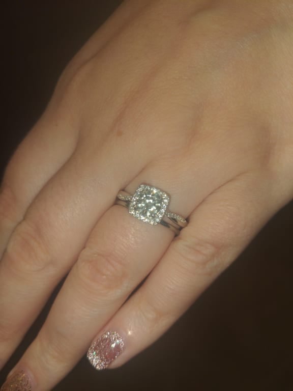 Oval diamond ring on hand