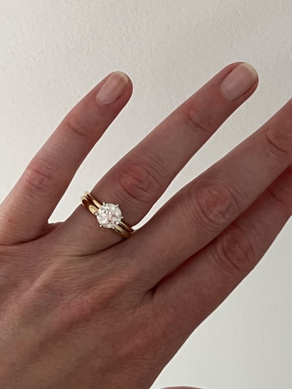 Oval diamond ring on hand