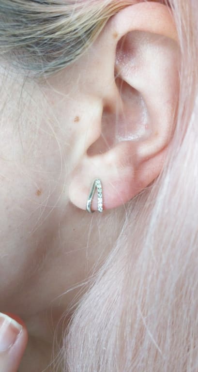 Oval diamond ring on hand