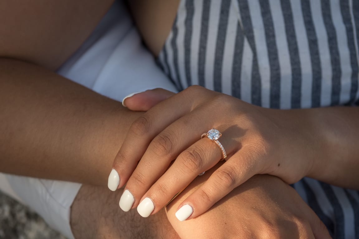 Oval diamond ring on hand