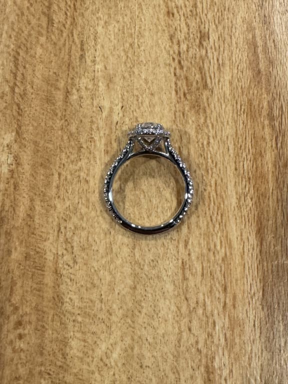 Oval diamond ring on hand