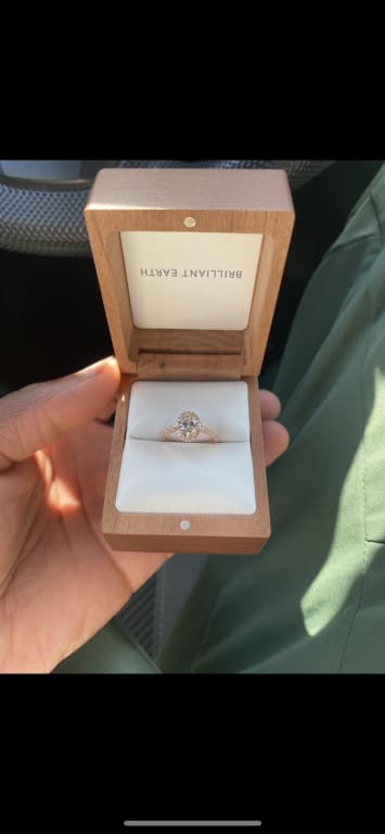 Oval diamond ring on hand