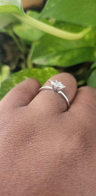 Oval diamond ring on hand