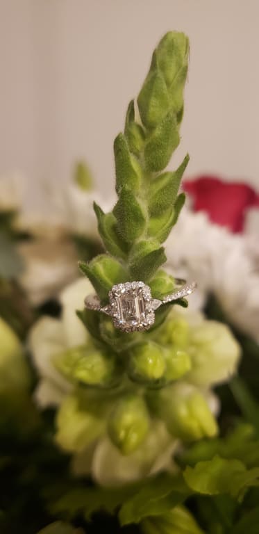 Oval diamond ring on hand