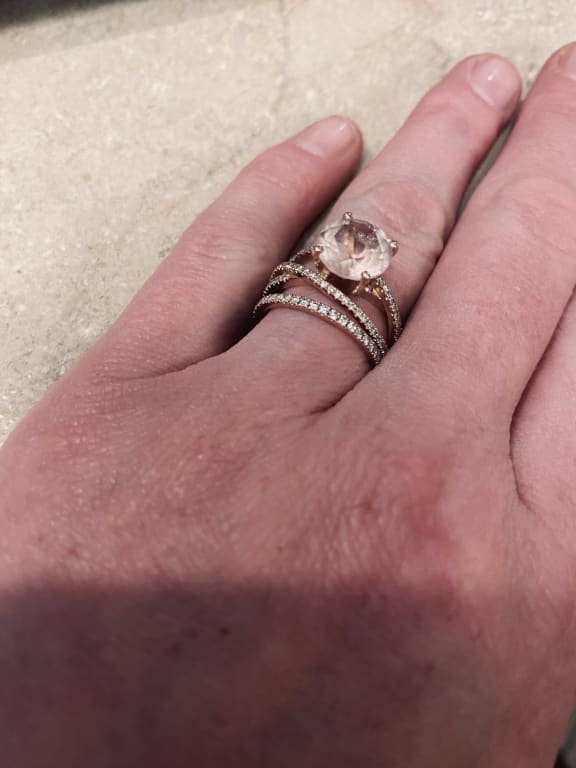 Oval diamond ring on hand