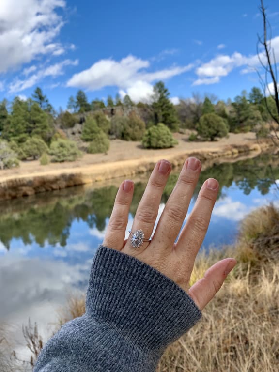 Oval diamond ring on hand
