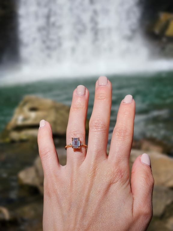 Oval diamond ring on hand