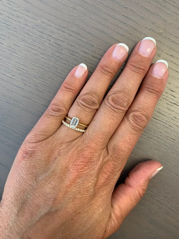Oval diamond ring on hand