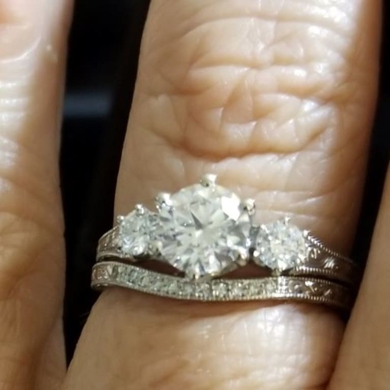 Oval diamond ring on hand