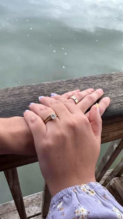 Oval diamond ring on hand
