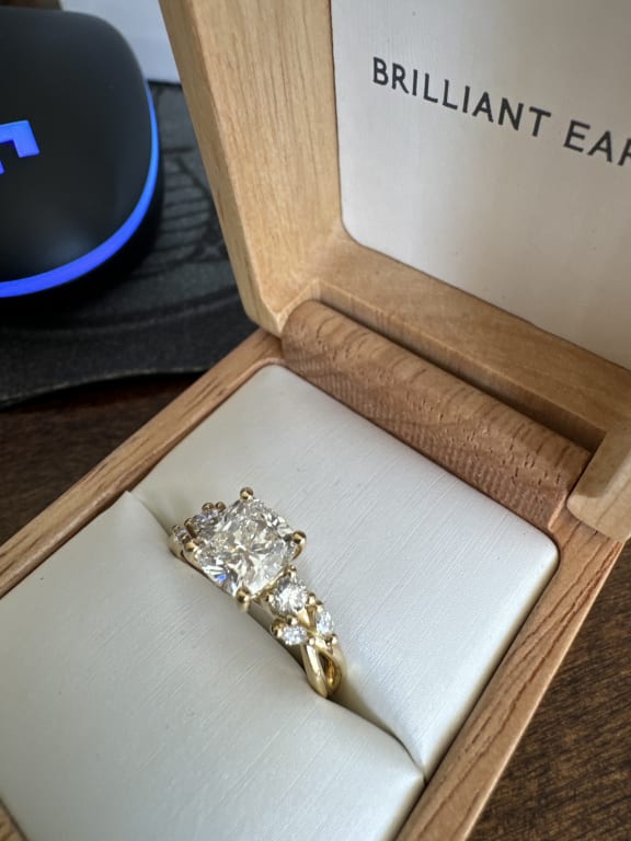 Oval diamond ring on hand