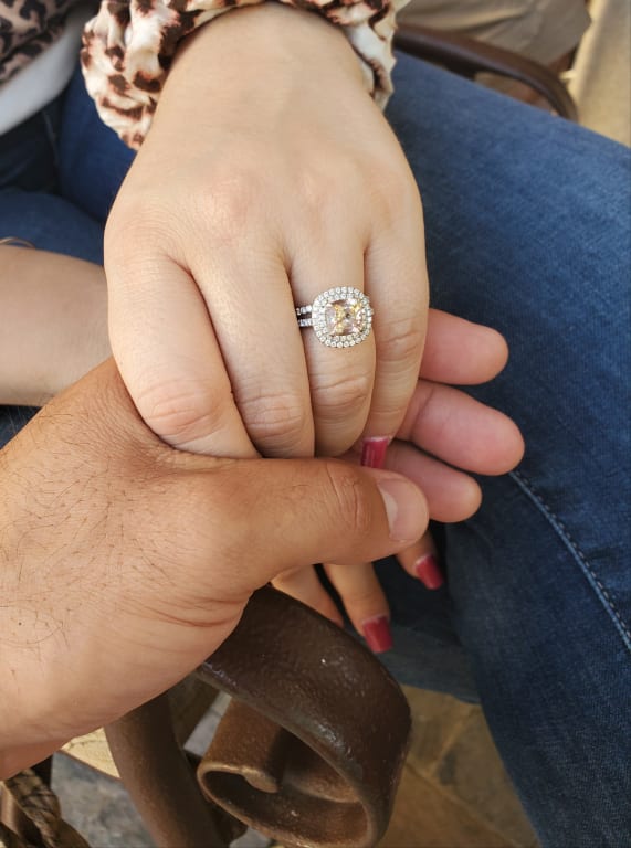 Oval diamond ring on hand