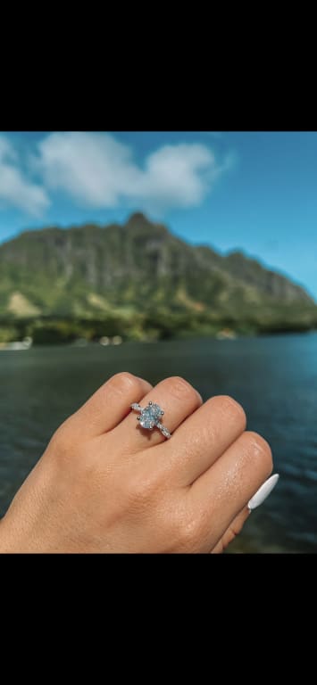 Oval diamond ring on hand