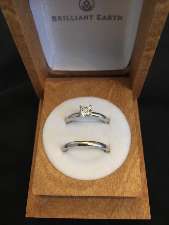 Oval diamond ring on hand