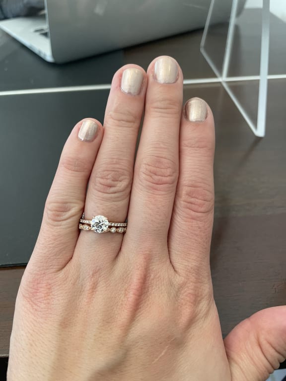 Oval diamond ring on hand