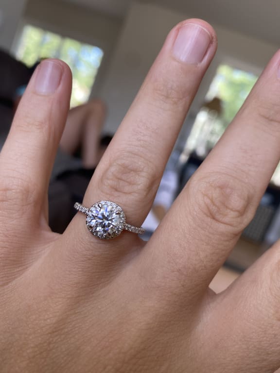 Oval diamond ring on hand