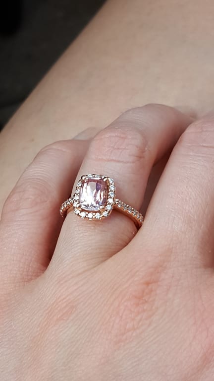 Oval diamond ring on hand
