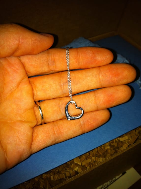 Oval diamond ring on hand