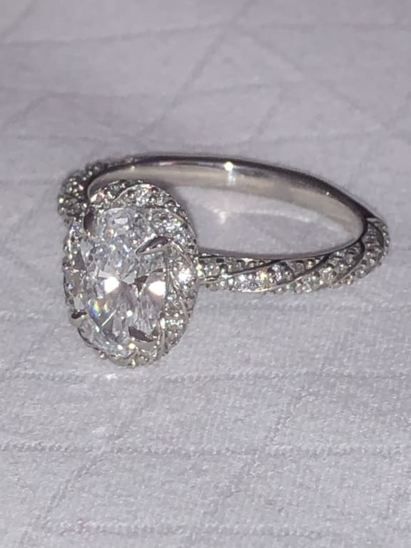 Oval diamond ring on hand